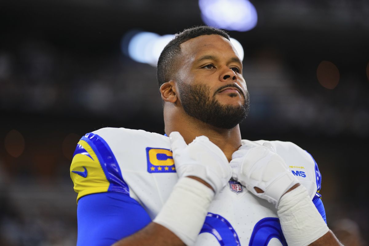 Aaron Donald #99 of the Los Angeles Rams looks on before kickoff against the Dallas Cowboys at AT&amp;T Stadium on October 29, 2023 in Arlington, Texas.