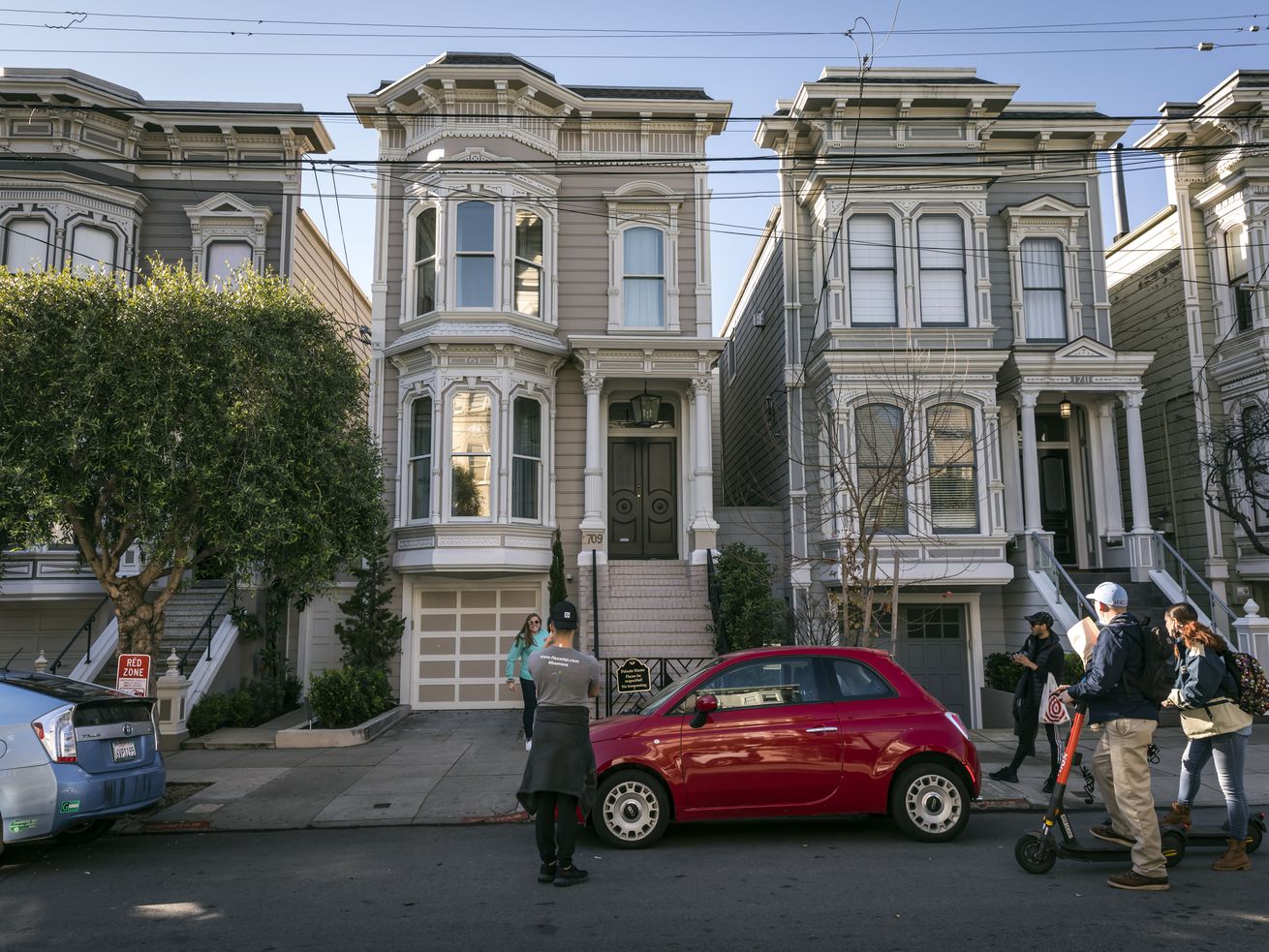 A photo of three signature Stick-style houses in San Francisco. 