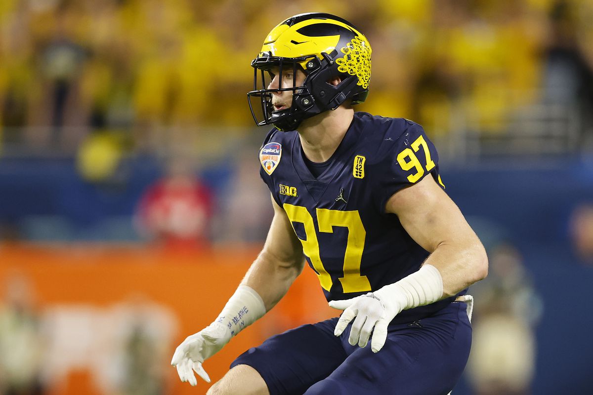 Aidan Hutchinson #97 of the Michigan Wolverines in action against the Georgia Bulldogs during the first quarter in the Capital One Orange Bowl for the College Football Playoff semifinal game at Hard Rock Stadium on December 31, 2021 in Miami Gardens, Florida.
