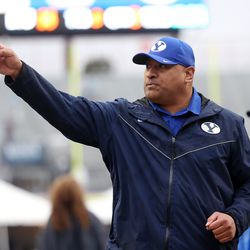 Brigham Young Cougars head coach Kalani Sitake waves to fans as he goes into the locker room at the half as BYU and UAB play in the Radiance Technologies Independence Bowl in Shreveport, Louisiana, on Saturday, Dec. 18, 2021.