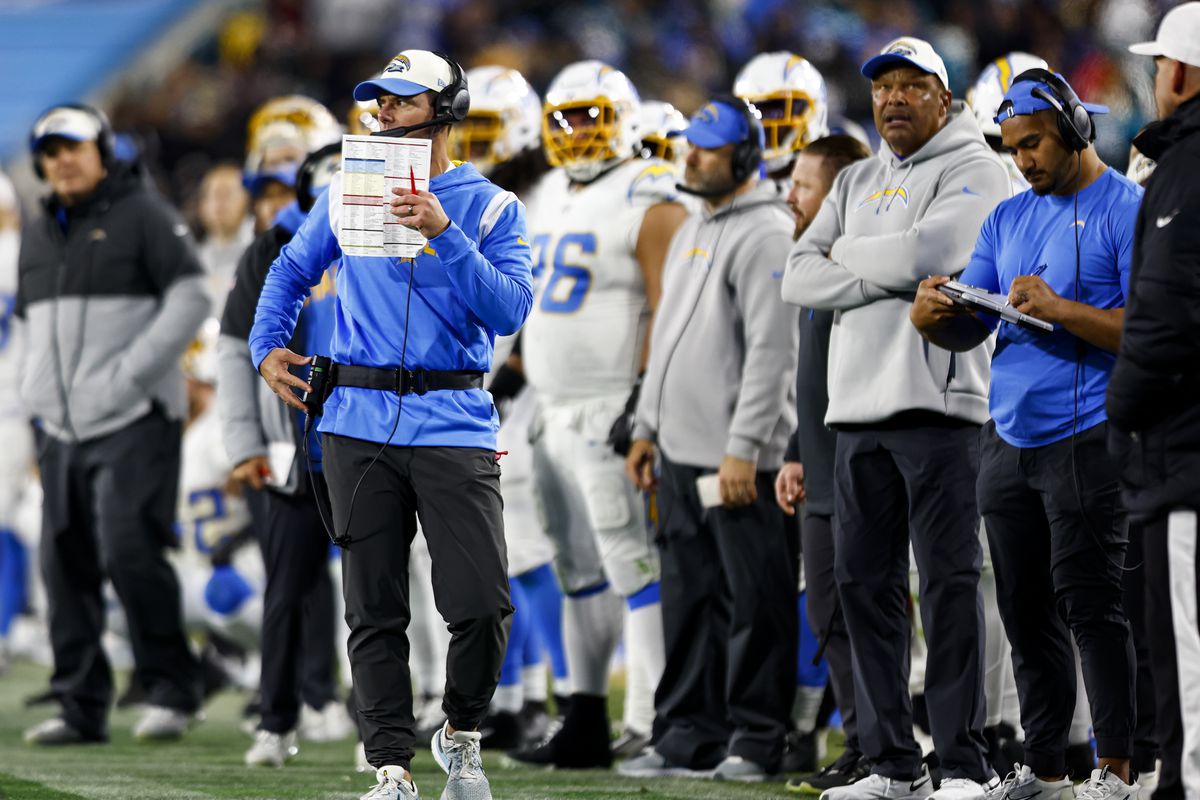 Head coach Brandon Staley of the Los Angeles Chargers coaches from the sidelines during the second quarter of an NFL wild card playoff football game against the Jacksonville Jaguars at TIAA Bank Field on January 14, 2023 in Jacksonville, Florida.