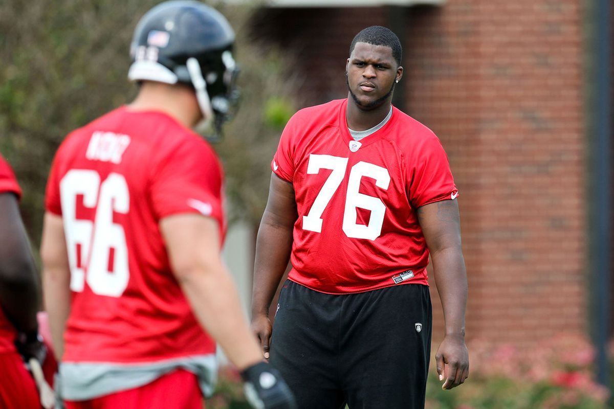FLOWERY BRANCH, GA - MAY 12: Lamar Holmes #76 of the Atlanta Falcons watches practice during the rookie minicamp at the Atlanta Falcons Training Facility on May 12, 2012 in Flowery Branch, Georgia. (Photo by Daniel Shirey/Getty Images)
