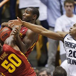 Iowa State's Dustin Hogue and teammate Deandre Kane grab a rebound ahead of BYU's Anson Winder as BYU and Iowa State play Wednesday, Nov. 20, 2013 in the Marriott Center in Provo. Iowa State won 90-88.