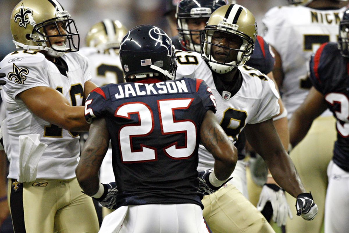 HOUSTON - AUGUST 20:  Cornerback Kareem Jackson #25 of the Houston Texans and Devery Henderson #19 of the New Orleans Saints get into an altercation at Reliant Stadium on August 20, 2011 in Houston, Texas.  (Photo by Bob Levey/Getty Images)