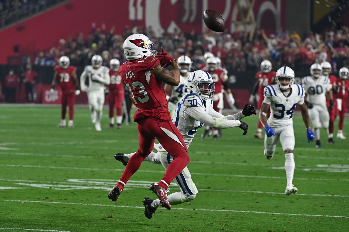 George Odum #30 of the Indianapolis Colts knocks the pass away from Christian Kirk #13 of the Arizona Cardinals at State Farm Stadium on December 25, 2021 in Glendale, Arizona.
