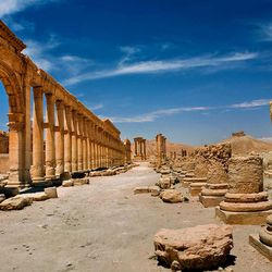 In this undated photo released by the Syrian official news agency SANA, shows the site of the ancient city of Palmyra, Syria. Palmyra is an archaeological gem that Syrian troops took back from Islamic State fighters on Sunday, March 27, 2016. Syrian state media and an opposition monitoring group say government forces backed by Russian airstrikes have driven Islamic State fighters from the historic central town of Palmyra, held by the extremists since May. (SANA via AP)