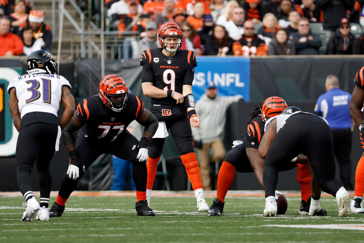 Joe Burrow #9 of the Cincinnati Bengals lines up for a play during the game against the Baltimore Ravens at Paul Brown Stadium on December 26, 2021 in Cincinnati, Ohio.