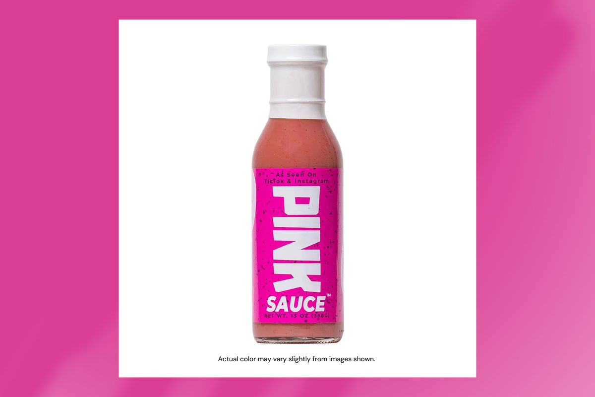A bottle of pink sauce above a line of text reading “actual color may vary slightly from image above.”