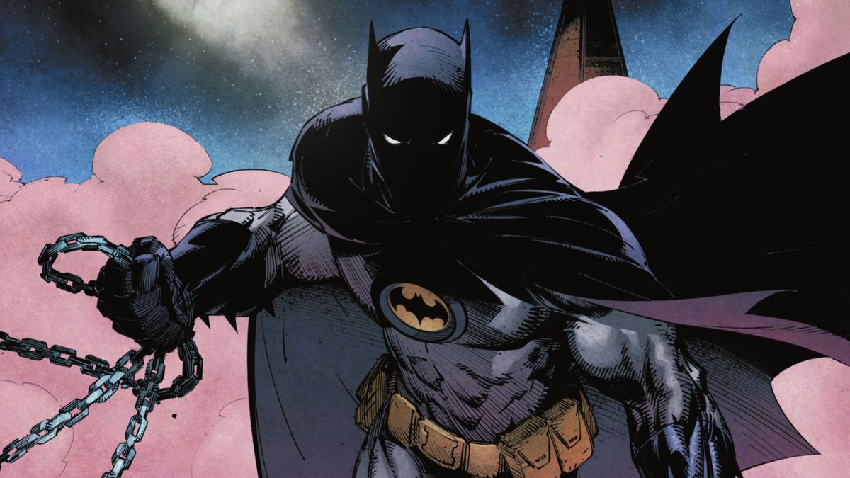 Batman strides menacingly across a rooftop in a cloud of smoke, chains clutched in both hands in Shadow War: Alpha #1 (2022).