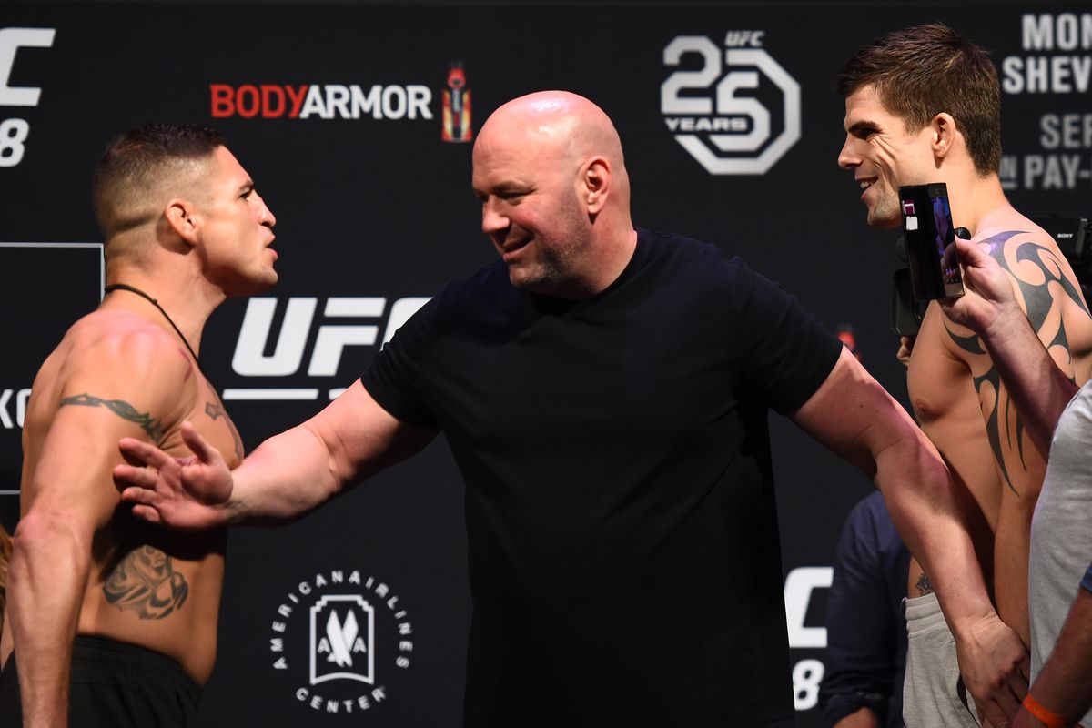Dana White separates Diego Sanchez and Craig White at the UFC 228 weigh-ins.