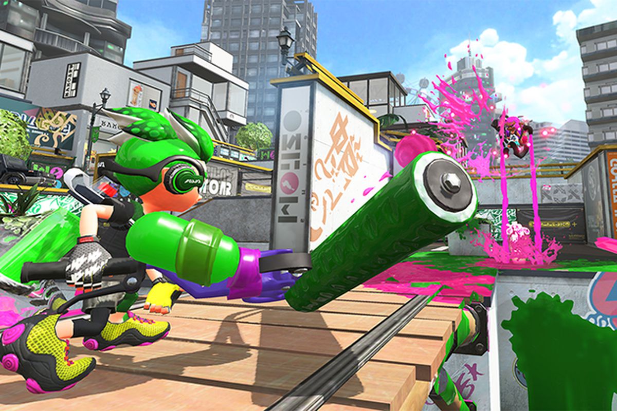 This Splatoon 2 screenshot shows a player character with green hair and a green paintroller turned away. In the distance, a character flies through the air, spilling two streams of pink paint to the ground.