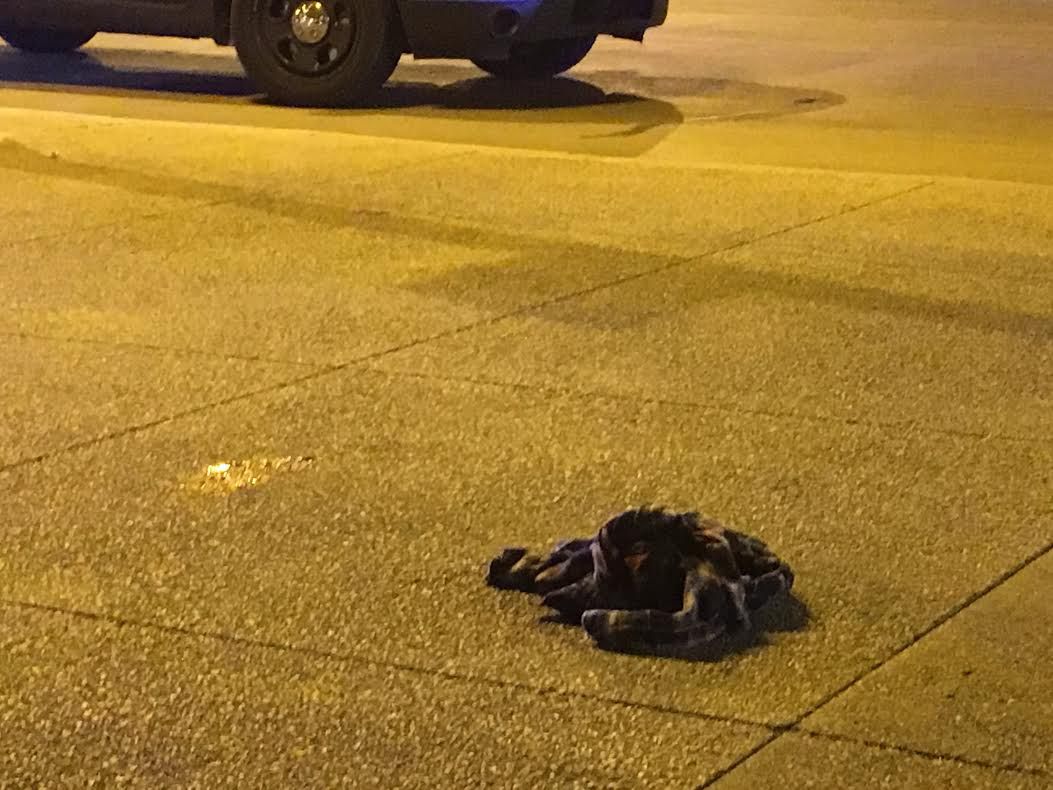Clothing on the ground at the scene of a shooting downtown at Michigan Avenue and Monroe Street. | Jacob Wittich / Sun-Times