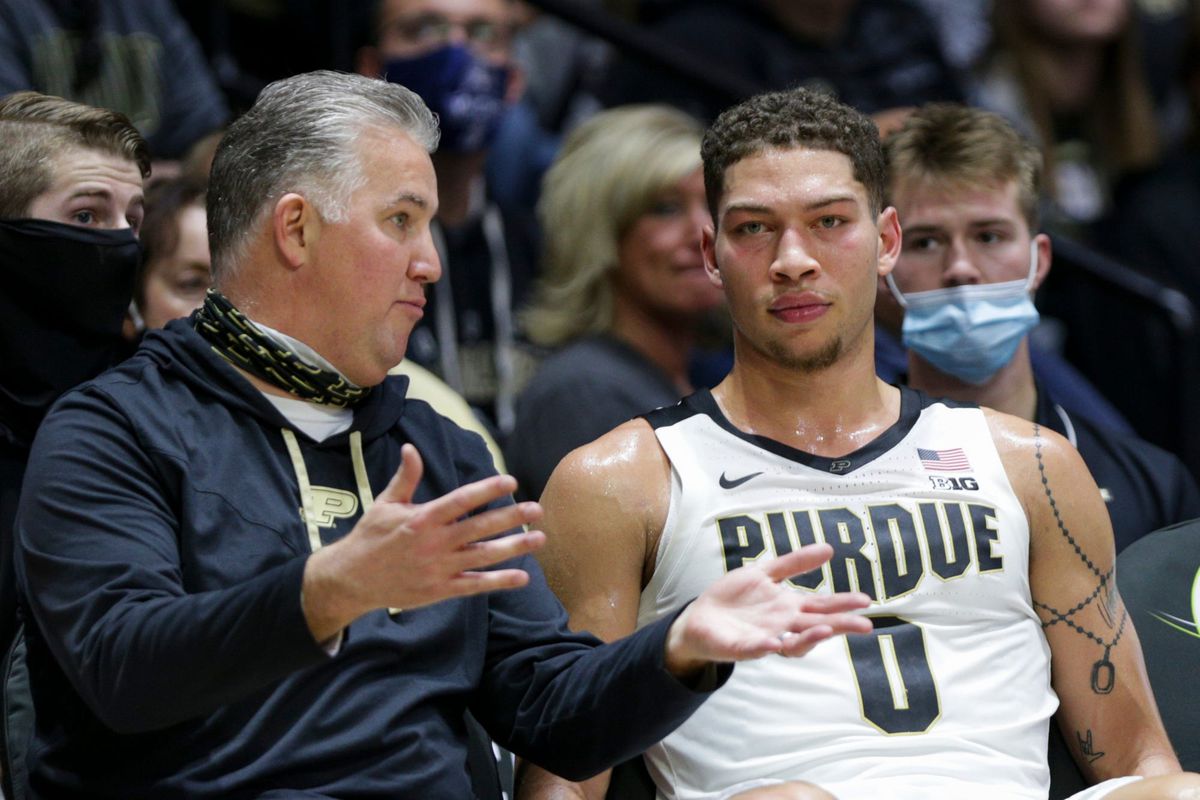 Purdue head coach Matt Painter and Purdue forward Mason Gillis talk during the second half of an NCAA men’s basketball game,&nbsp;