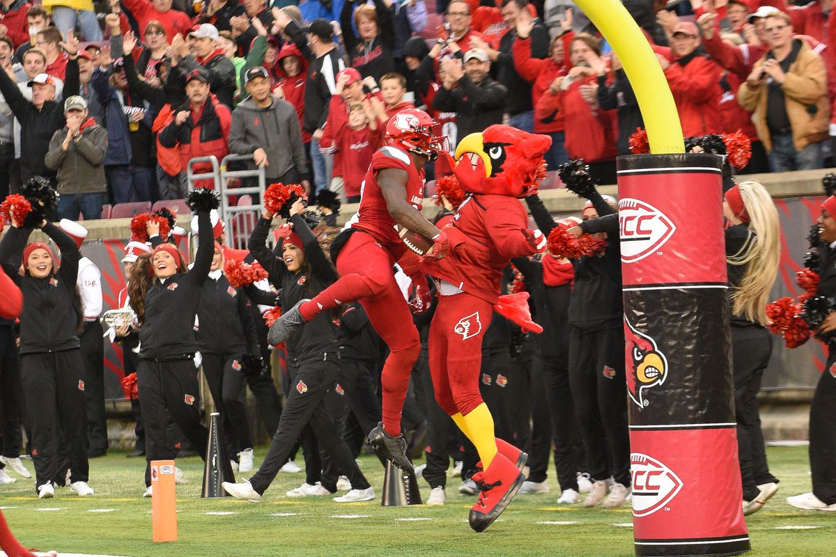 Seth Dawkins chest bumps Louie after a touchdown in the 56-10 win against Syracuse.