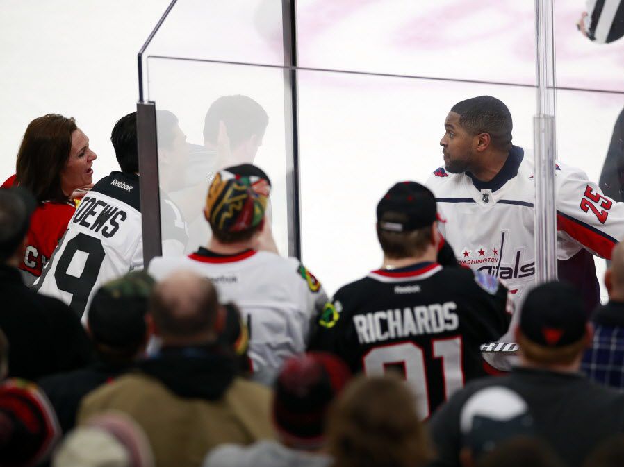Washington Capitals right wing Devante Smith-Pelly (25) argues with Blackhawks fans from the penalty box during the third period of an NHL hockey game Feb. 17, 2018, in Chicago. | <em>Associated Press</em>