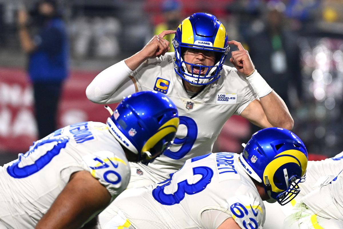 Matthew Stafford #9 of the Los Angeles Rams calls a play at the line of scrimmage in the second quarter of the game against the Arizona Cardinals at State Farm Stadium on December 13, 2021 in Glendale, Arizona.