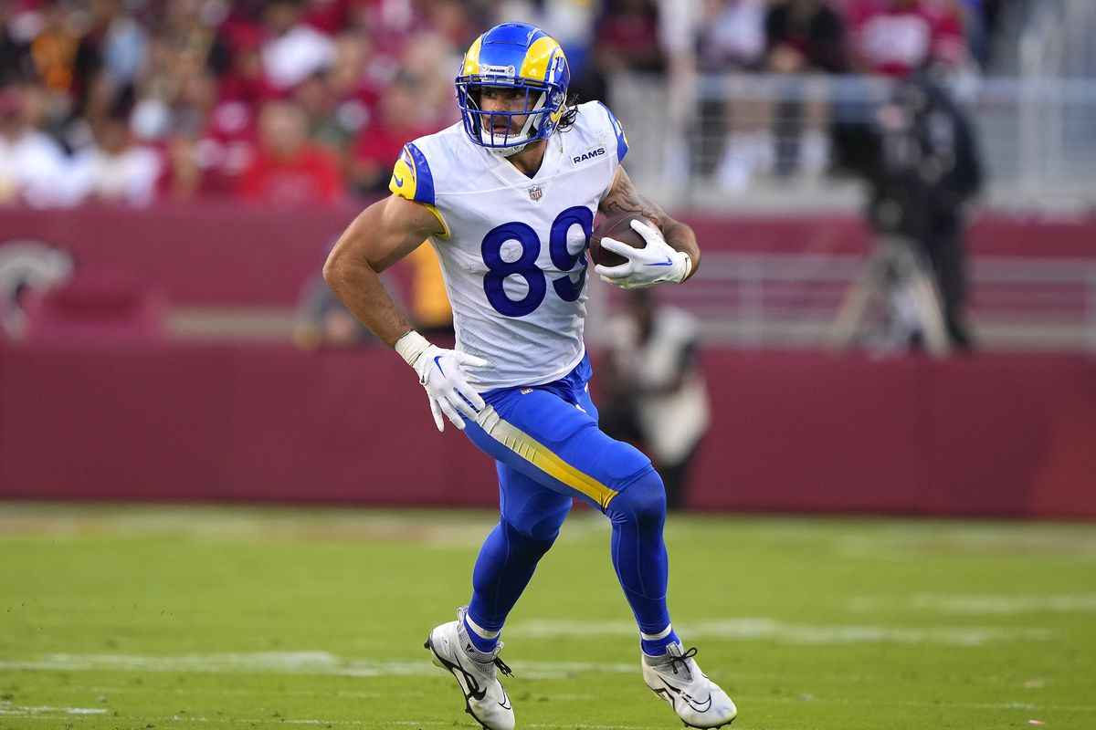 Tight end Tyler Higbee #89 of the Los Angeles Rams runs with the ball after making a catch against the San Francisco 49ers during the second quarter at Levi’s Stadium on October 03, 2022 in Santa Clara, California.