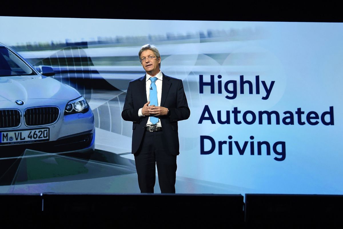 BMW's Elmar Frickenstein speaks at the 2015 Consumer Electronics Show in Las Vegas.