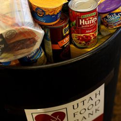 A barrel of donated food is on display at the kickoff of the 30th annual Scouting for Food event at the Capitol in Salt Lake City on Thursday, March 17, 2016.  
