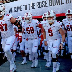 The Badgers take the field before the 106th Rose Bowl Game.