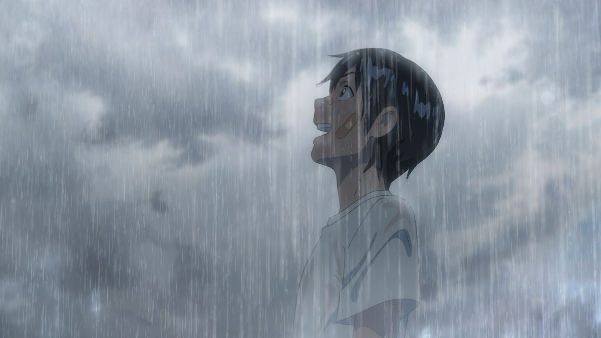 a young man with a bandaged face stands in the pouring rain, looking delighted, in the anime film Weathering With You