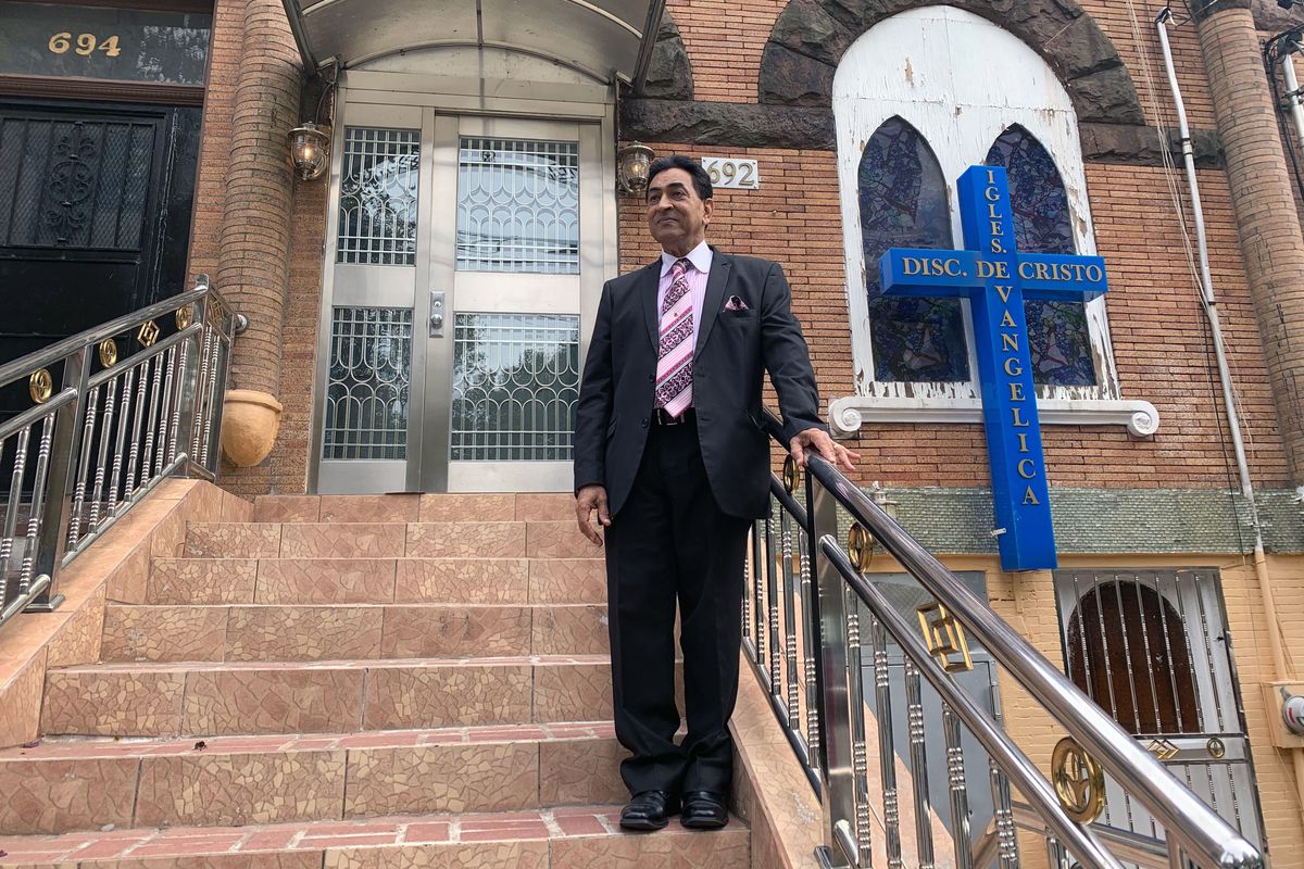 Pastor Felix Gross stands into front of the Bronx church he’s led since 1979, Oct. 25, 2020.