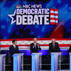 Democratic presidential candidate former vice president Joe Biden, center, speaks during the Democratic primary debate hosted by NBC News at the Adrienne Arsht Center for the Performing Arts, Thursday, June 27, 2019, in Miami, as from left, entrepreneur Andrew Yang, South Bend Mayor Pete Buttigieg, Sen. Bernie Sanders, I-Vt., and Sen. Kamala Harris, D-Calif., listen.
