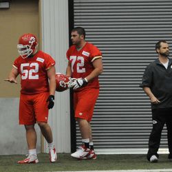 Kansas City Chiefs offensive lineman Adrin Haughton (68), and offensive lineman Eric Fisher (72) work on drills during the rookie minicamp at the University of Kansas Hospital Training Complex. 