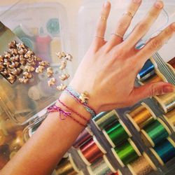 The Bare Collection trunk show featured a friendship bracelet making station.