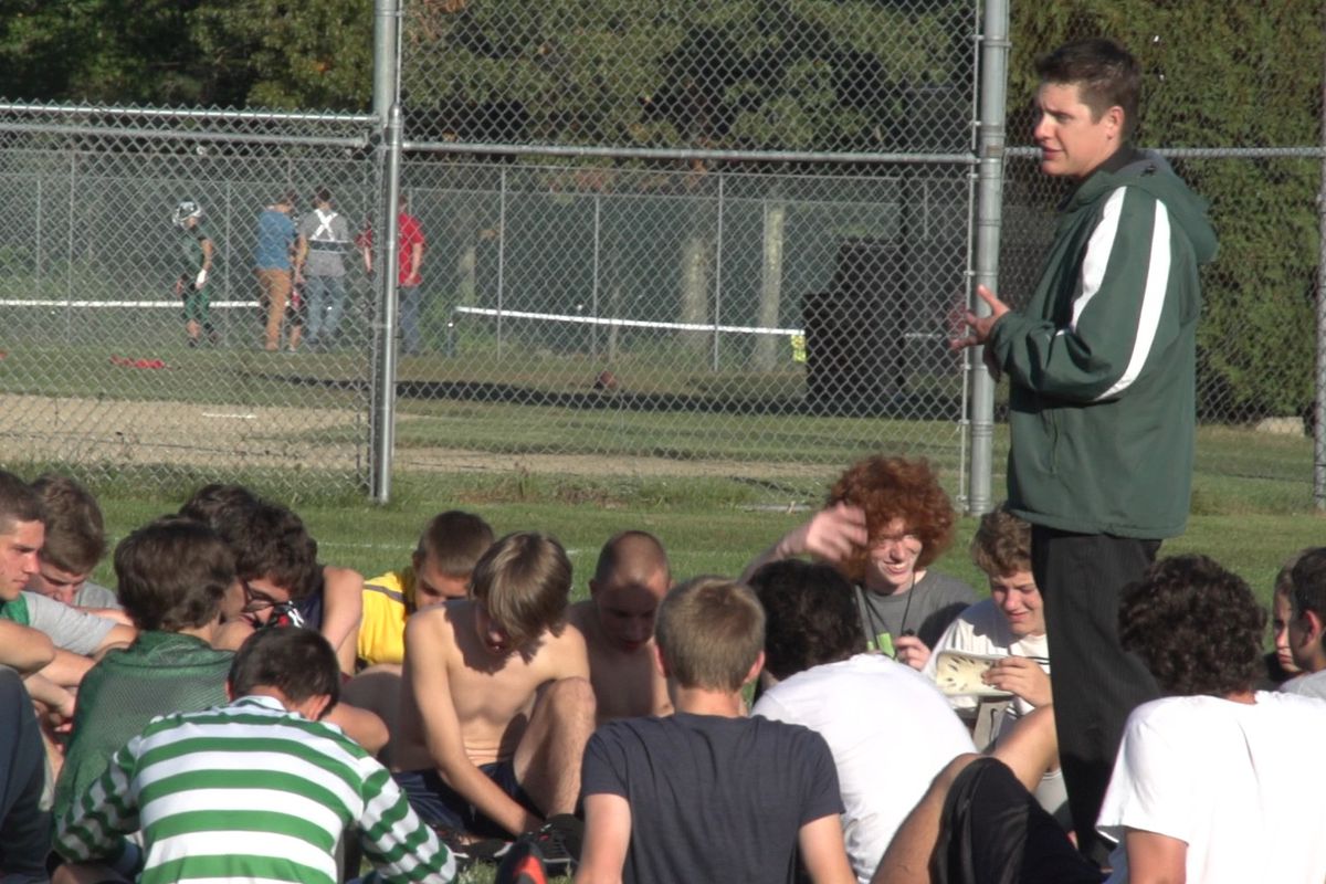 Stephen Alexander talks to his boys high school soccer team