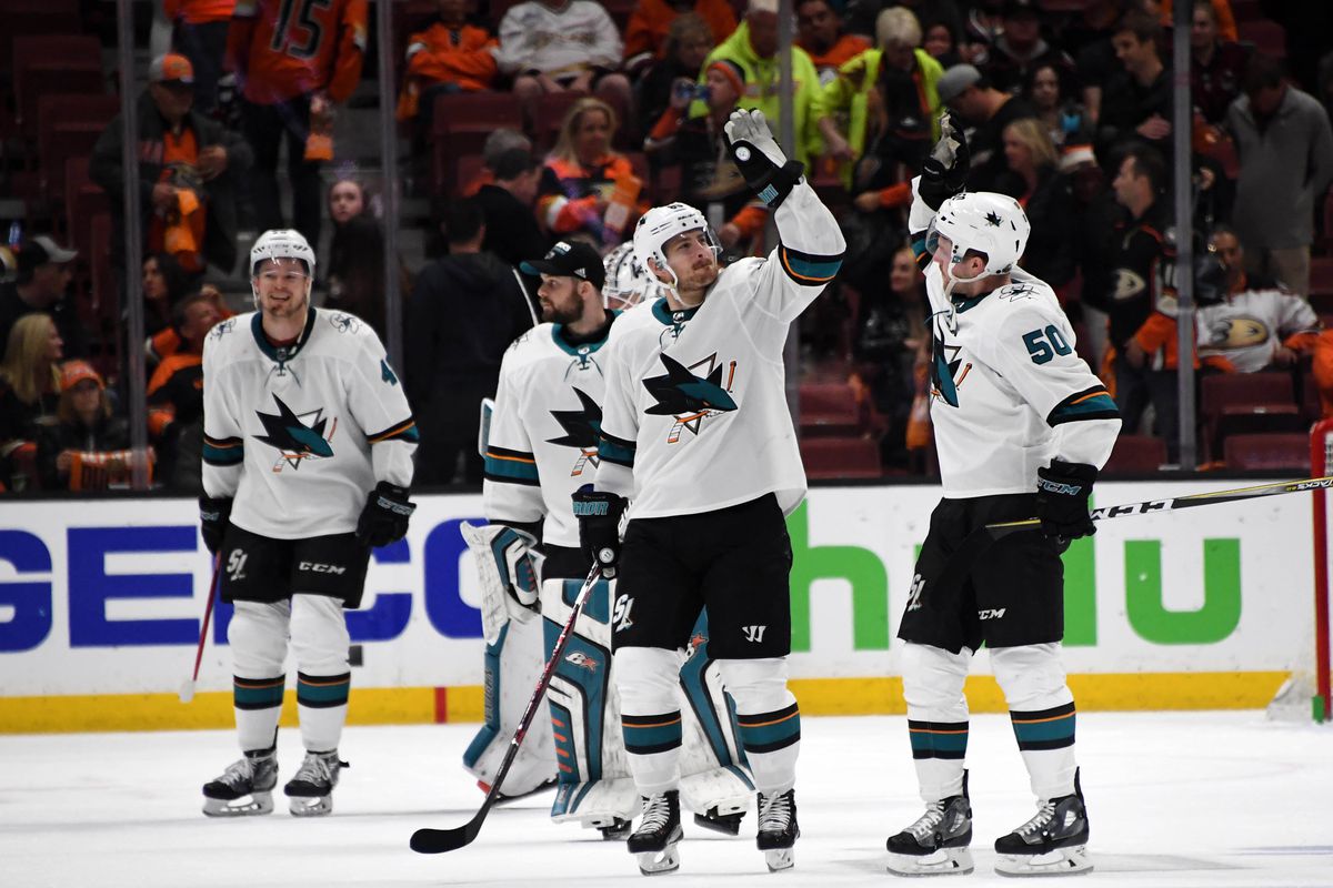Apr 14, 2018; Anaheim, CA, USA; San Jose Sharks center Melker Karlsson  (68) and center Chris Tierney (50) celebrate after game two of the first  round of the 2018 Stanley Cup Playoffs against the Anaheim Ducks at  Honda Center. The Sharks defeated the Du
