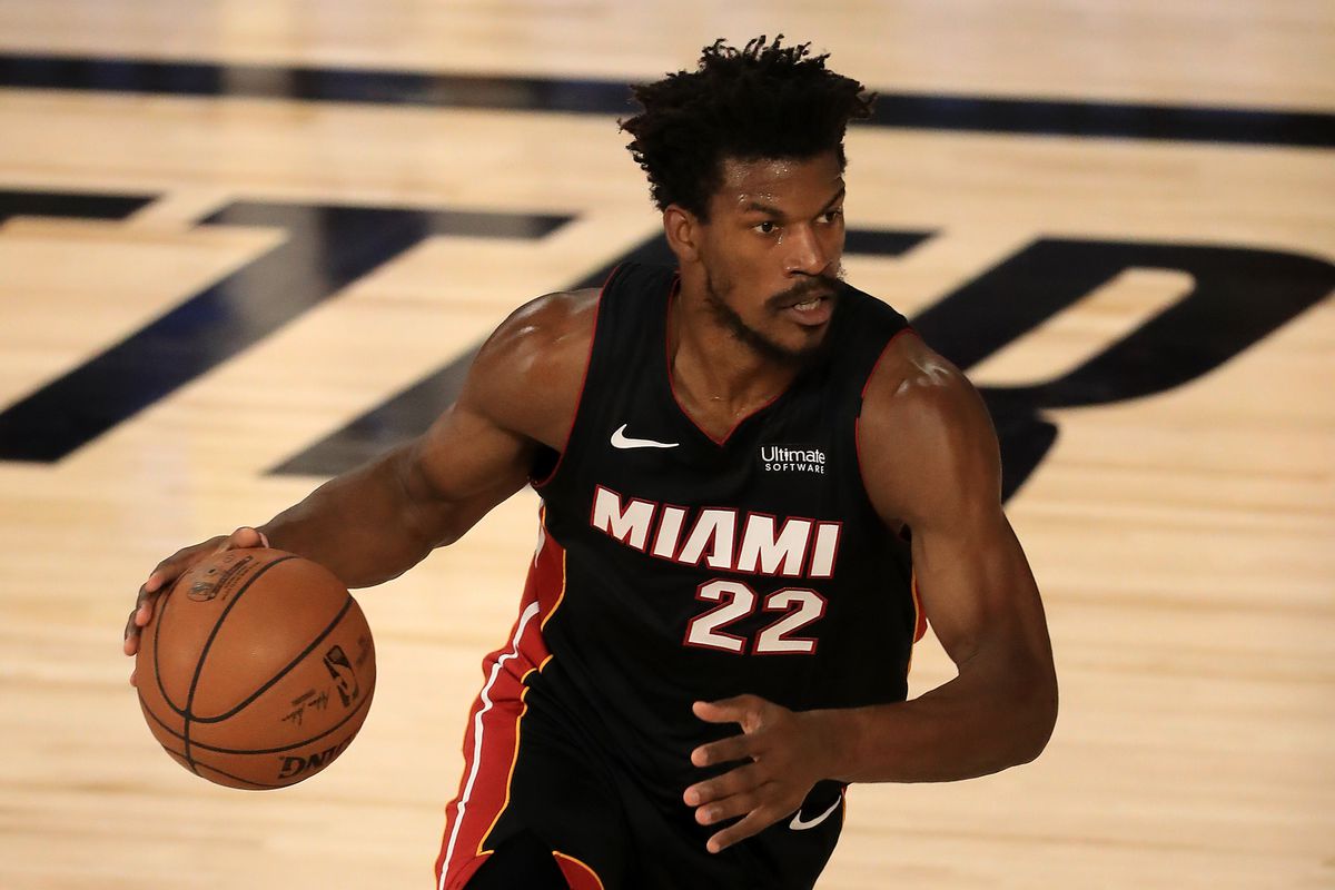 Jimmy Butler of the Miami Heat dribbles the ball during the first quarter against the Milwaukee Bucks in Game Three of the Eastern Conference Second Round during the 2020 NBA Playoffs at the Field House at the ESPN Wide World Of Sports Complex on September 04, 2020 in Lake Buena Vista, Florida.&nbsp;