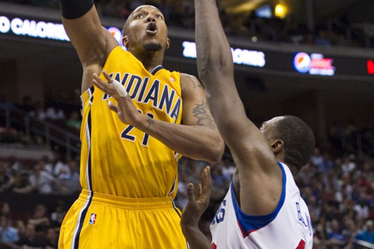 Apr 17, 2012; Philadelphia, PA, USA; Indiana Pacers forward David West (21) shoots over the defense of Philadelphia 76ers forward Elton Brand (42) during the second quarter at the Wells Fargo Center. Mandatory Credit: Howard Smith-US PRESSWIRE