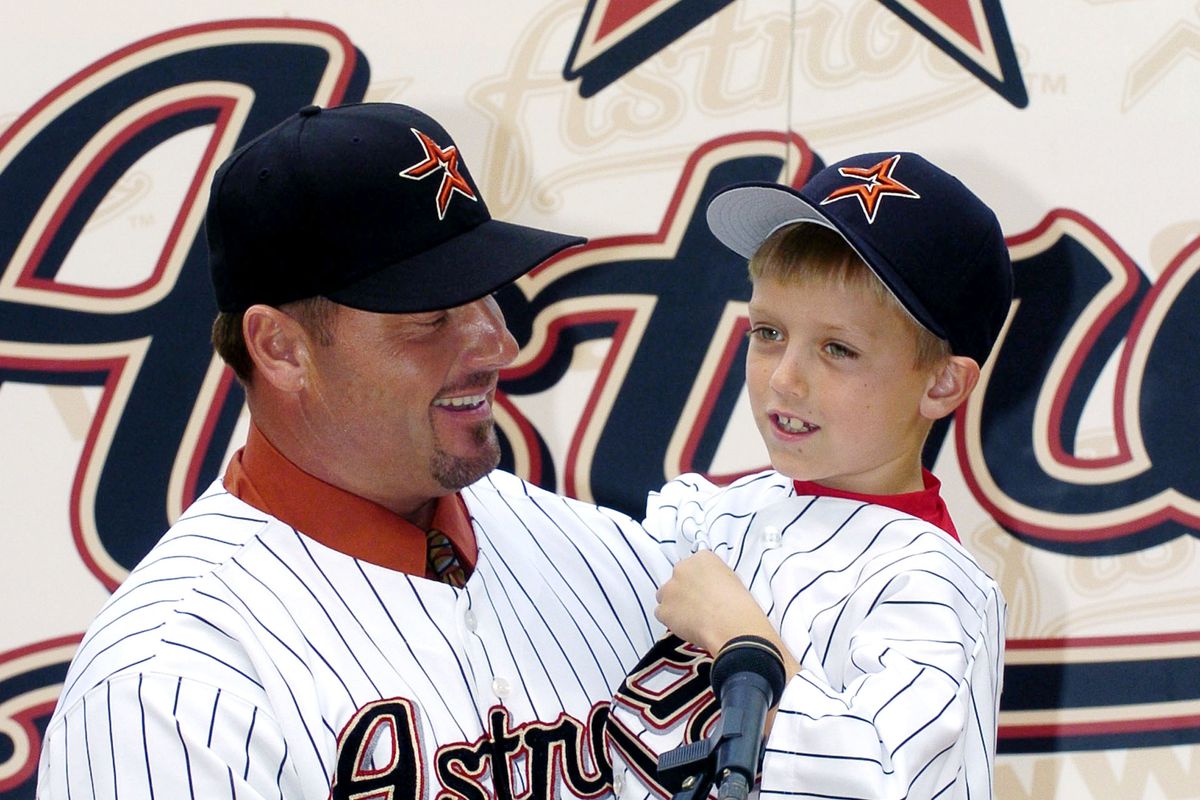 Roger Clemens signs with the Houston Astros