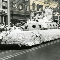 The Days of ’47 royalty ride a float in the parade in Salt Lake City on July 24, 1950.