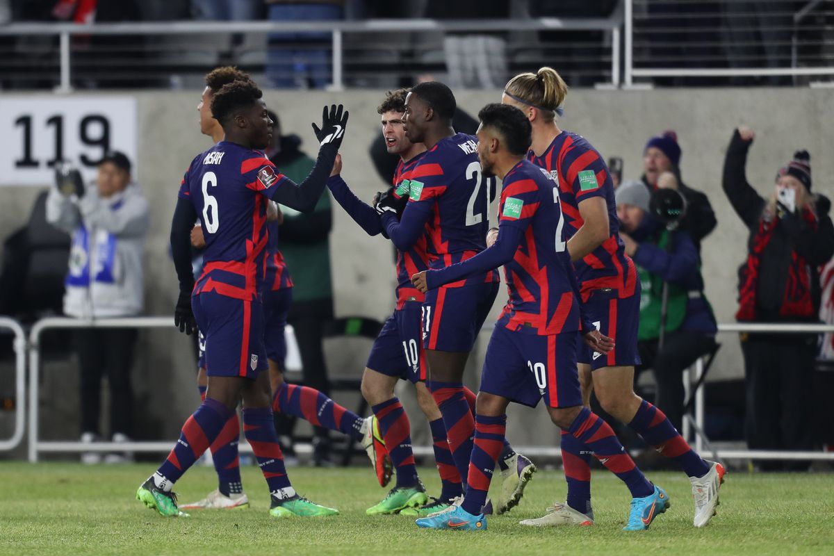 Antonee Robinson #5 of United States celebrates with his teammates after scoring his team’s first goal during the FIFA World Cup Qatar 2022 qualifiers match between United States and El Salvador at Lower.com Field on January 27, 2022 in Columbus, Ohio.