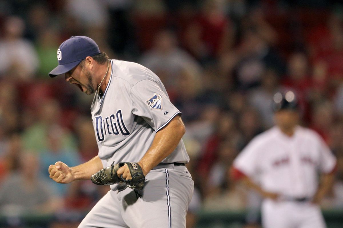 BOSTON, MA  - JUNE 21:  Heath Bell #21 of the San Diego Padres reacts in the ninth inning after a 5-4 win against the Boston Red Sox at Fenway Park on June 21, 2011 in Boston, Massachusetts.  (Photo by Jim Rogash/Getty Images)