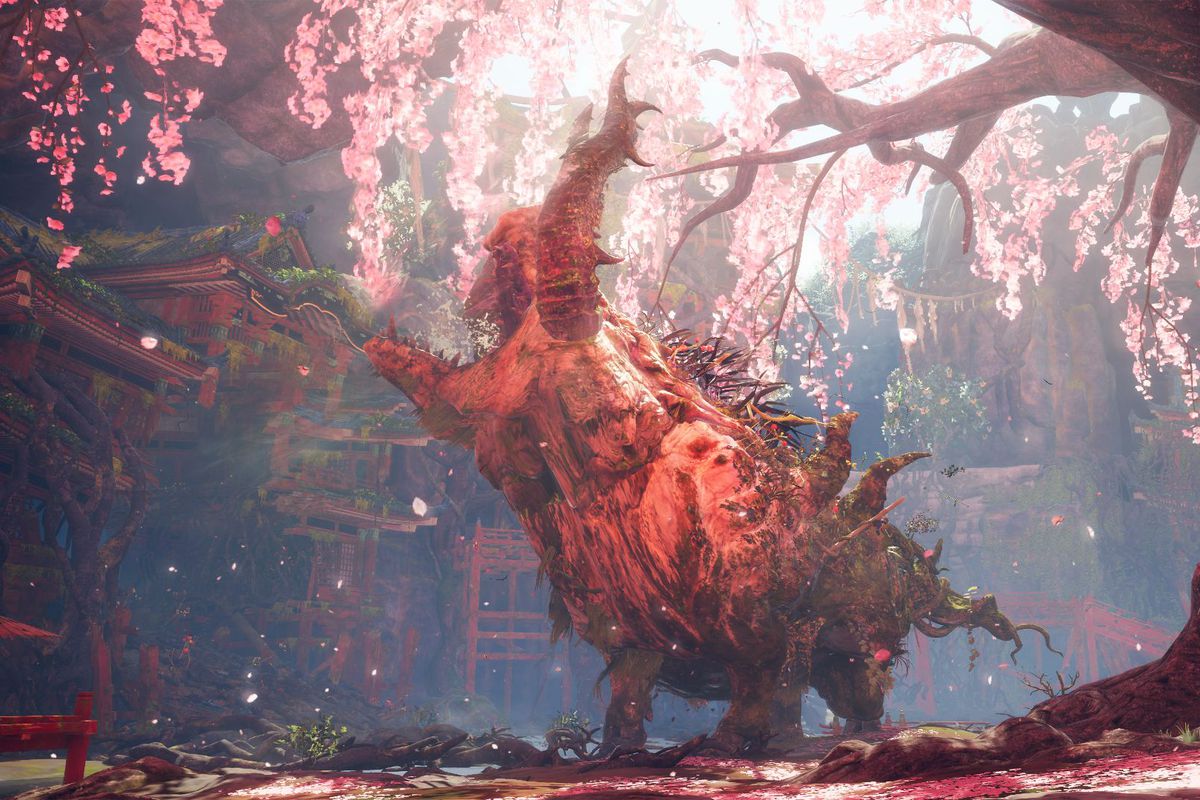 A giant beast roars in a mystical pink forest in Wild Hearts.