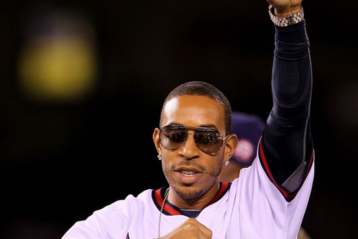ANAHEIM, CA - AUGUST 06:  Recording artist <strong><em>Ludacris</em></strong> performs on the field after the game between the Seattle Mariners and the Los Angeles Angels of Anaheim on August 6, 2011 at Angel Stadium in Anaheim, California.