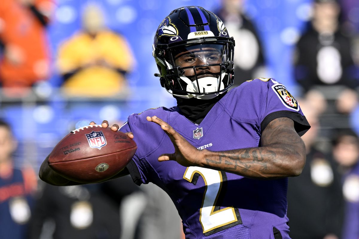 Lamar Jackson #8 of the Baltimore Ravens warms up prior to a game against the Denver Broncos at M&amp;T Bank Stadium on December 04, 2022 in Baltimore, Maryland.