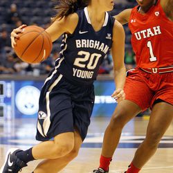BYU Cougars guard Cassie Broadhead (20) tries to dribble past Utah Utes guard Gabrielle Bowie (1) in an NCAA women's basketball game at the Marriott Center in Provo, Saturday, Dec. 12, 2015.