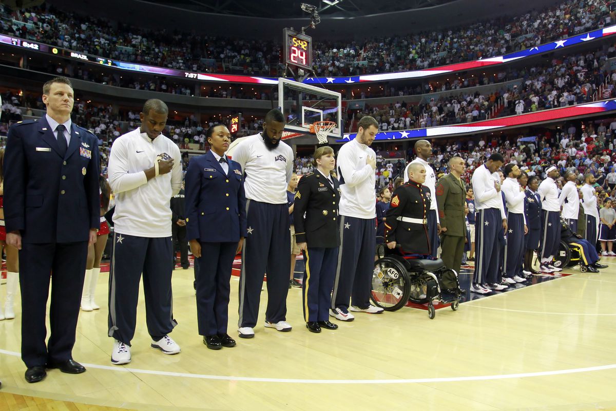 July 16, 2012; Washington, DC, USA; Members of team USA stand with servicemen and servicewomen during the national anthem prior to team USA's game against team Brazil at Verizon Center. Team USA won 80-69. Mandatory Credit: Geoff Burke-US PRESSWIRE