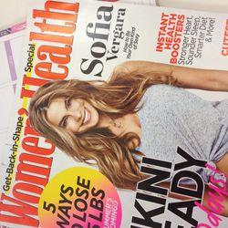 Flipping through this month's <i>Women’s Health</i> with a cup of black coffee. I loved seeing my book included in the magazine (page 74!).