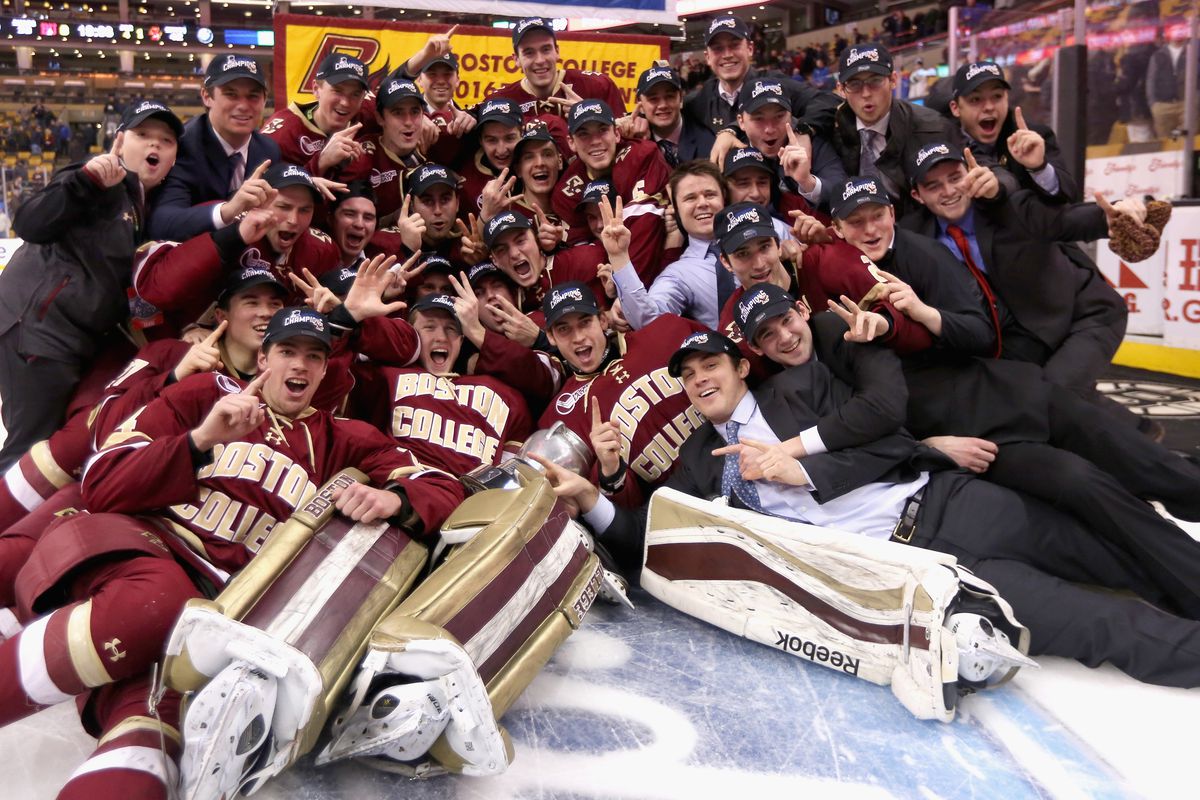  Members of Boston College celebrate after defeating Boston University during the Beanpot Tournament championship game at TD Garden on February 8, 2016 in Boston, Massachusetts.