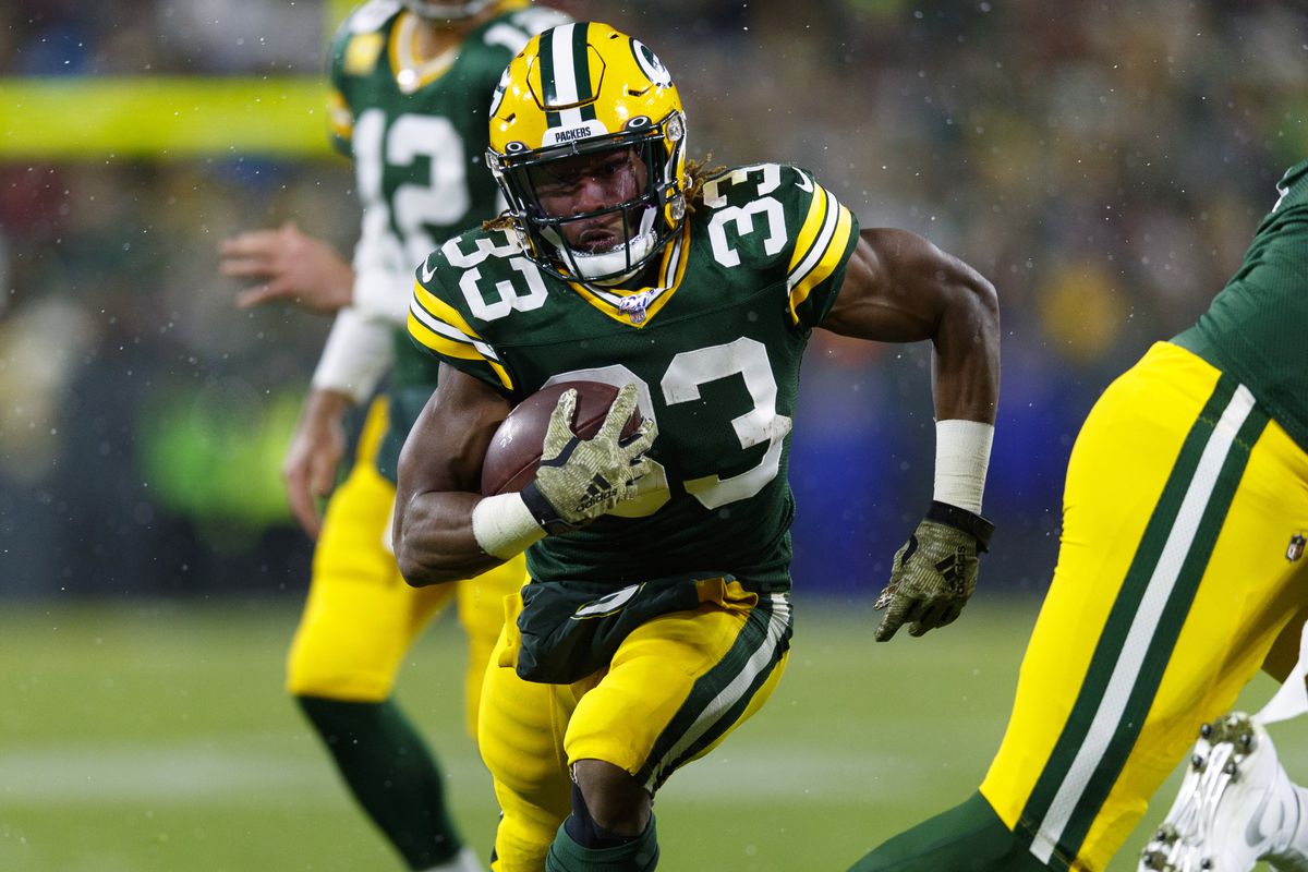Green Bay Packers running back Aaron Jones rushes for a touchdown during the third quarter against the Carolina Panthers at Lambeau Field.