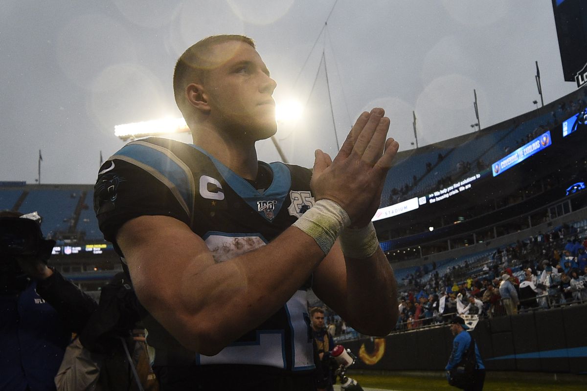 Carolina Panthers running back Christian McCaffrey leaves the field after the game at Bank of America Stadium.