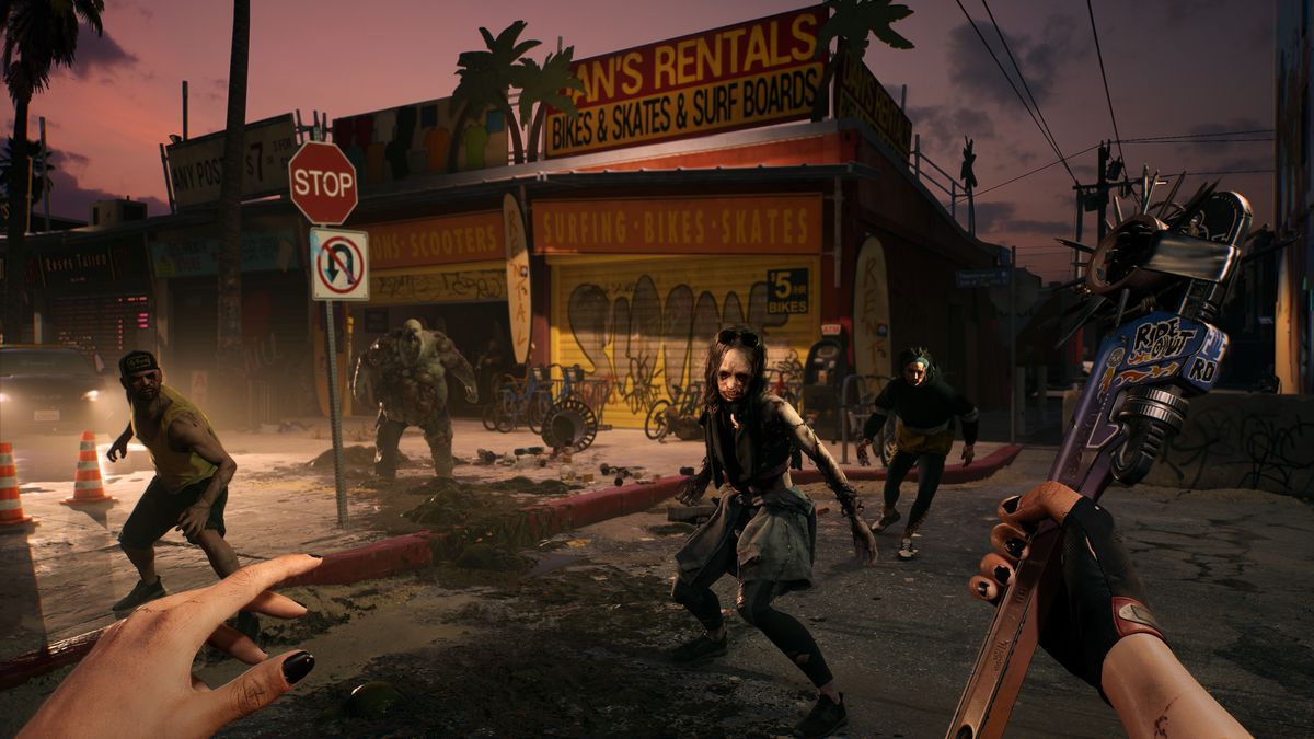 A first-person view of the player, holding a customised wrench, facing attacking zombies in a dark street