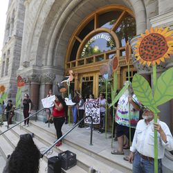Local organizations joined with national indigenous organizers and land, air and water protectors to oppose the Utah Inland Port during a rally at the City-County Building in Salt Lake City on Tuesday, July 9, 2019.