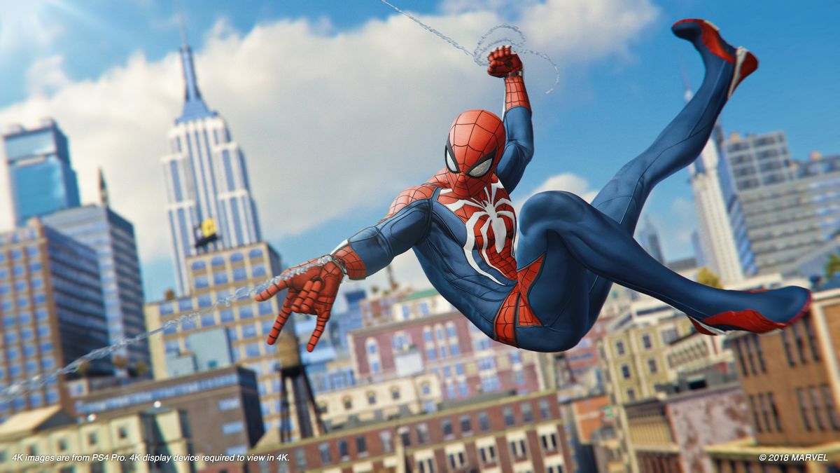Spider-Man swinging through New York City with the Empire State Building in the background in Marvel’s Spider-Man