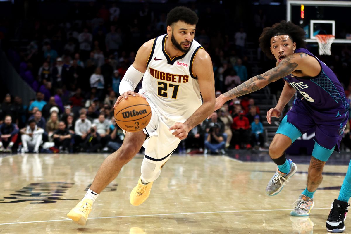 Jamal Murray #27 of the Denver Nuggets drives to the basket during the second half of an NBA game against the Charlotte Hornets at Spectrum Center on December 23, 2023 in Charlotte, North Carolina